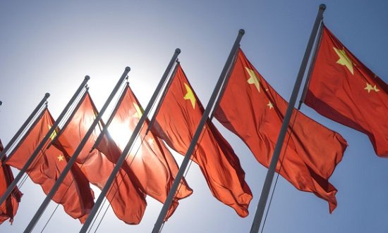 China's economy loses momentum as COVID curbs hit factories, consumers