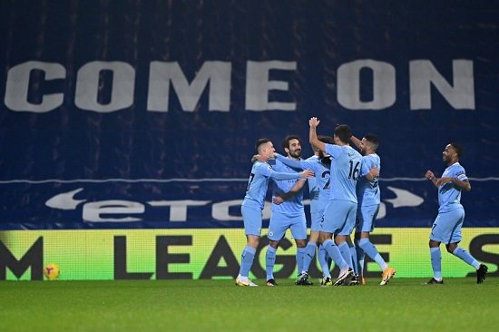 Five-star Man City move top of the Premier League